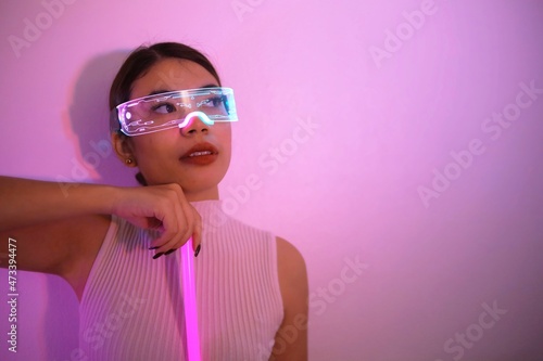 Asian woman with future digital glasses,future technology concept.