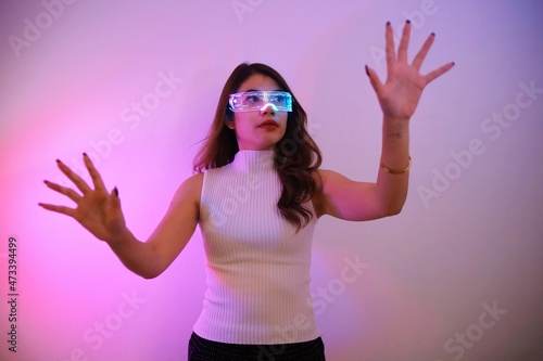 Asian woman with future digital glasses,future technology concept.