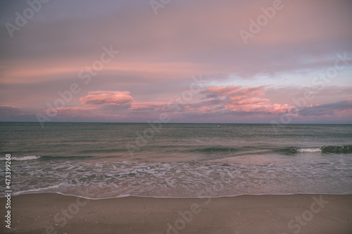 Fototapeta Naklejka Na Ścianę i Meble -  Sea shore at sunset in winter