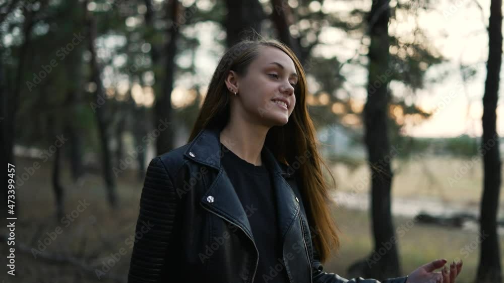 Girl walks through natural forest. Woman hiking alone. Teenager girl in nature at sunset. Fantasy of people in park in autumn. Active lifestyle. People in forest. Tourist walk in autumn forest park Girl walks through natural forest. Woman hiking alone. Teenager girl in nature at sunset. Fantasy of people in park in autumn. Active lifestyle. People in forest. Tourist walk in autumn forest park