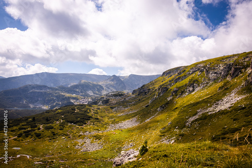 Beautiful landscape of a hill in Rila mountain, Bulgaria. Warm sunny autumn day. Famous hiking trail in Bulgaria. High quality photo