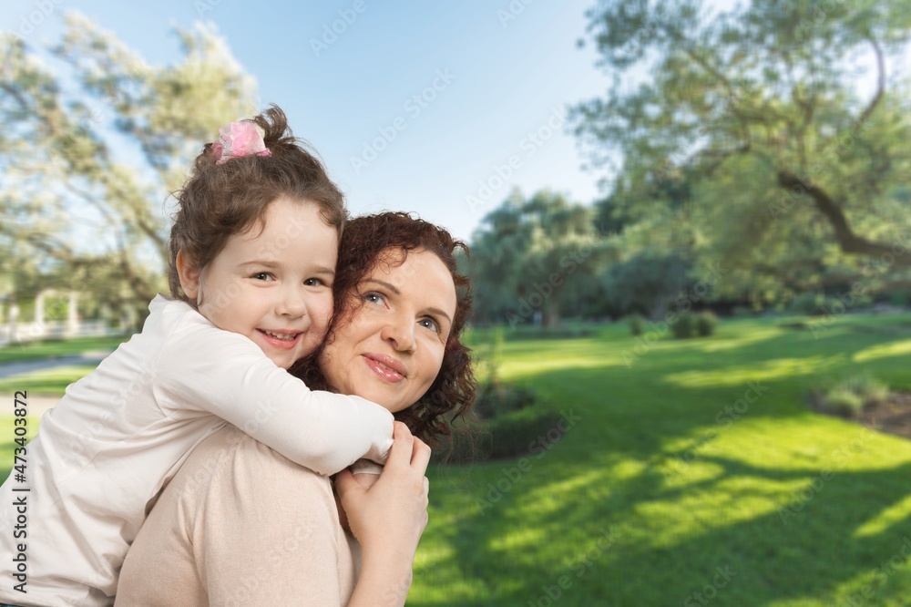 Happy mother having fun with her daughter outdoor Happy mother having fun with her daughter outdoor