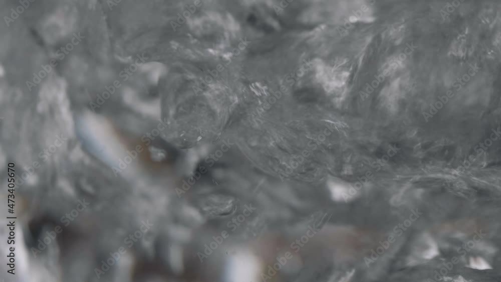 Surface of boiled water calms down after boiling. Surface of boiled water calms down after boiling.