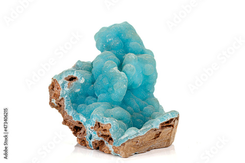 Macro pink Smithsonite mineral stone on microcline on white background photo