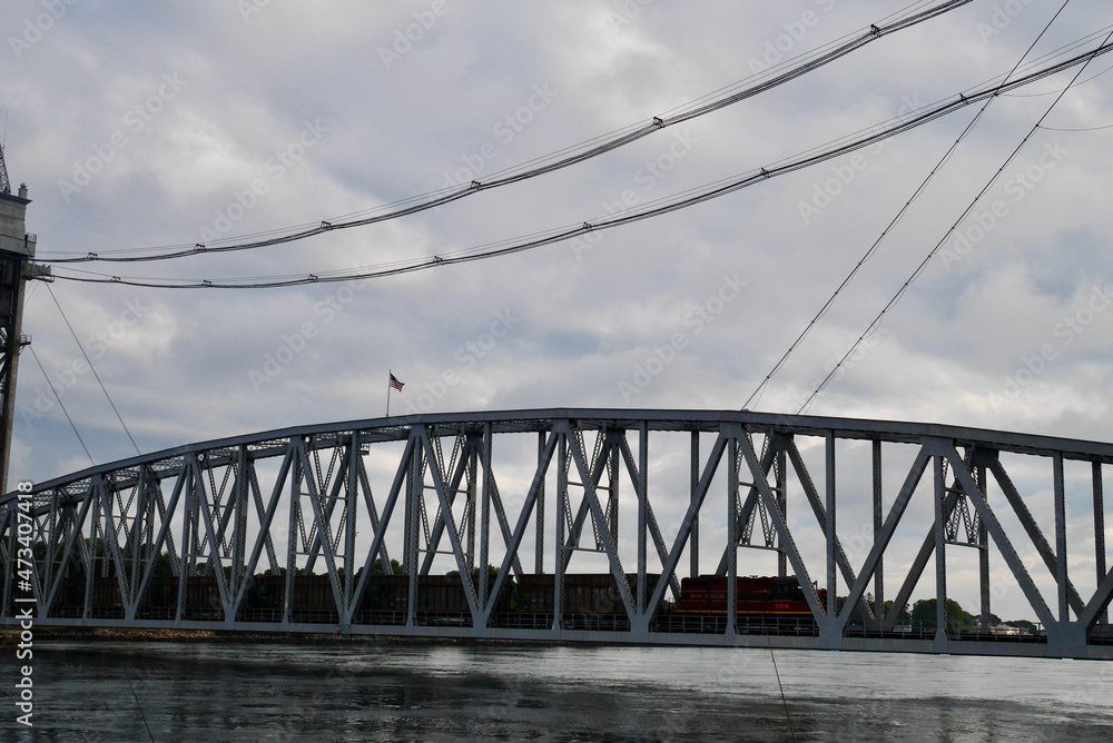 Obraz premium Train running on Cape Cod Canal Railway Bridge, Massachusetts, USA.