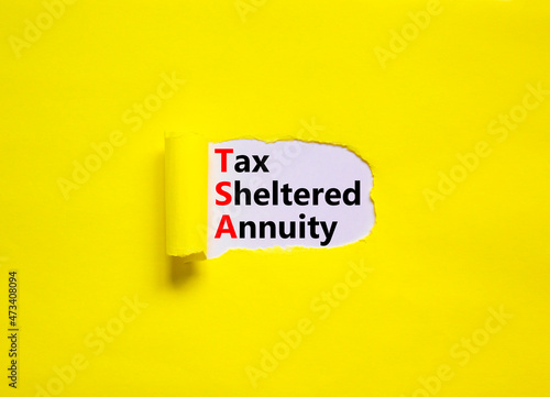 TSA, tax sheltered annuary symbol. Concept words TSA, tax sheltered annuary on white paper. Beautiful yellow background, copy space. Business and TSA, tax sheltered annuary concept.