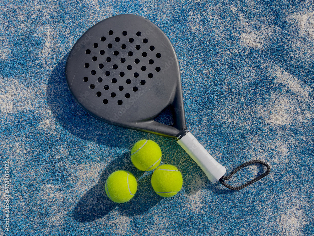 padel tennis, paddel tenis balls and rackets Photos | Adobe Stock