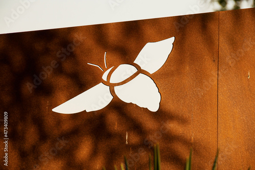 Corten wall with laser cut beetle