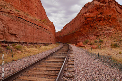 Railway track going through canyon in Moab area, close to Corona Arch trail. Utah, USA. photo