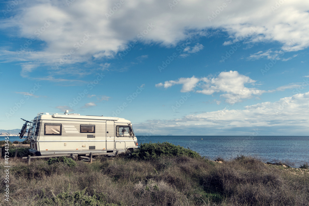 Camper on the mediterranean coast. Mobile home travel and vacations Camper on the mediterranean coast. Mobile home travel and vacations
