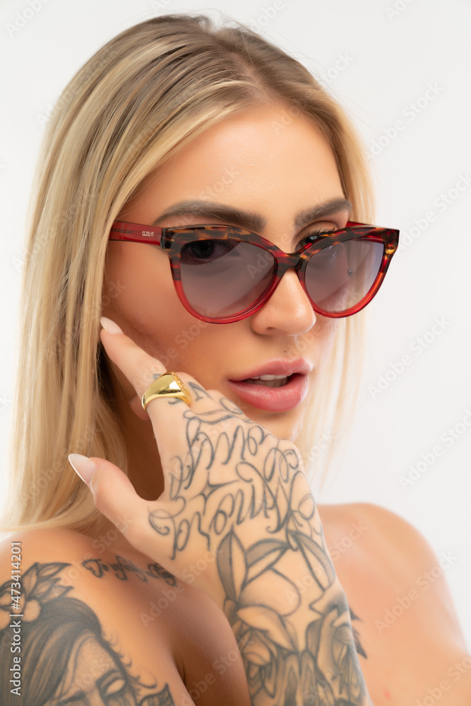 portrait of a woman, with glasses, studio shot. portrait of a woman, with glasses, studio shot.