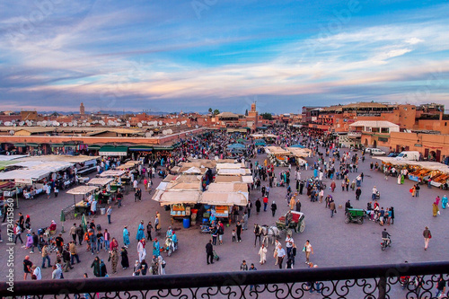 Crowd in Jemaa el Fna square in late afternoon at Marrakech, Morocco photo
