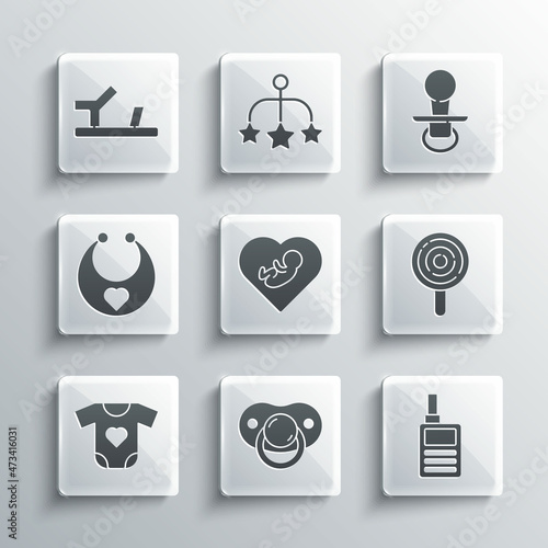 Set Baby dummy pacifier, Monitor Walkie Talkie, Lollipop, inside heart, clothes, bib, shoes and icon. Vector