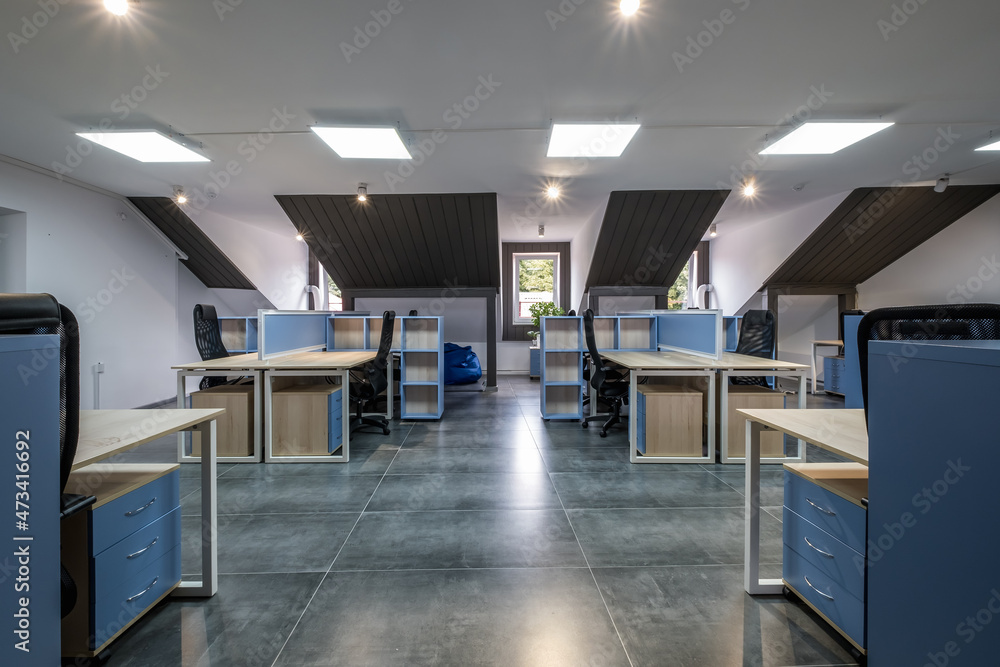 interior in empty work mansard room in modern office or coworking