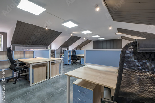 interior in empty work mansard room in modern office or coworking