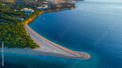 Aerial morning drone view of Zlatni Rat cape on Brac island in Croatia. Magical and beautiful peninsula, famous on croatian coast.
