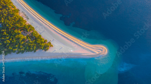 Aerial vertical drone view of Zlatni Rat cape on Brac island in Croatia. Magical and beautiful peninsula, famous on croatian coast.