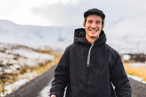 Young male traveler exploring the western region of iceland photo