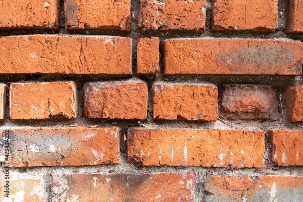 Naklejka premium Brick wall. Grunge wall background. Background of old brickwork of vintage brick wall. Rustic brick texture.