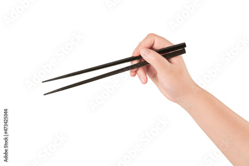  Woman hand holding chopsticks isolated