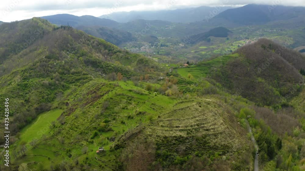 Aerial Forward Scenic Shot Of Green Natural Hills Against Cloudy Sky - Apennine Mountains, Italy Aerial Forward Scenic Shot Of Green Natural Hills Against Cloudy Sky - Apennine Mountains, Italy