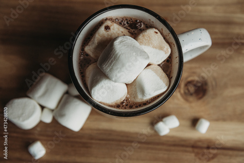 Overhead view of mug filled with hot chocolate and marshmallows photo