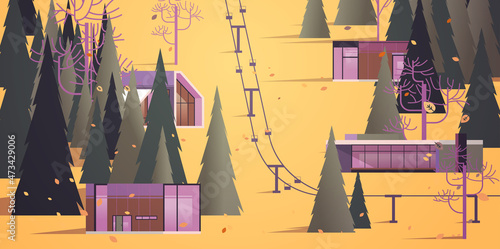 cableway in mountains residential houses area ski resort in autumn season landscape background