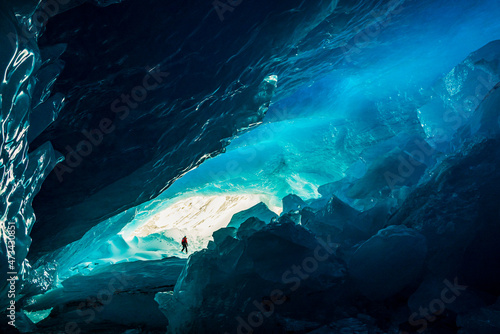 Exploring Glacial Ice Cave Inside Banff National Park photo