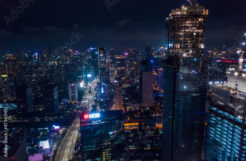 Wallpaper Mural Close up aerial view of high rise skyscraper under construction in modern city center at night Tall skyscrapers in downtown Jakarta, Indonesia Torontodigital.ca