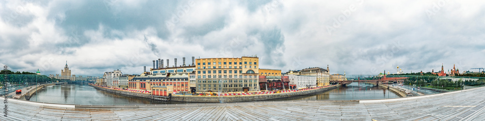A wide panorama of the center of Moscow, Russia, State Electric Station No. 1, the Moskva river, Floating bridge