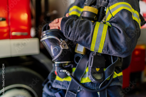 firefighter with his breathing equipment photo