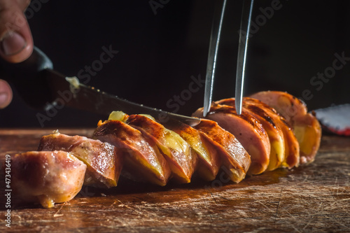 sausage with apricot, cheese and walnuts, Christmas concept, selective focus photo