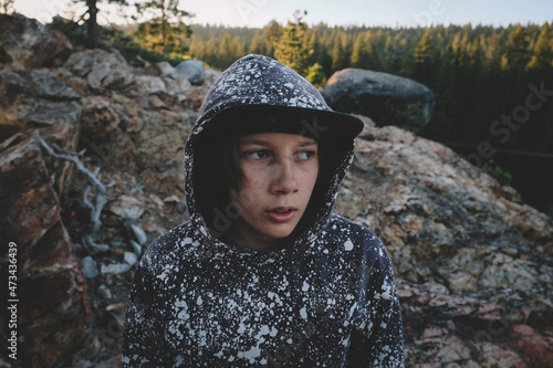 Boy in Paint Splattered Hoodie Hiking in the High Sierra photo