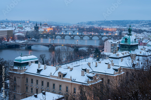 Bridges over Vltava river at dusk seen from Letna park in winter, Prague, Czech Republic