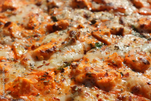 Edible uniform background - pizza surface.
