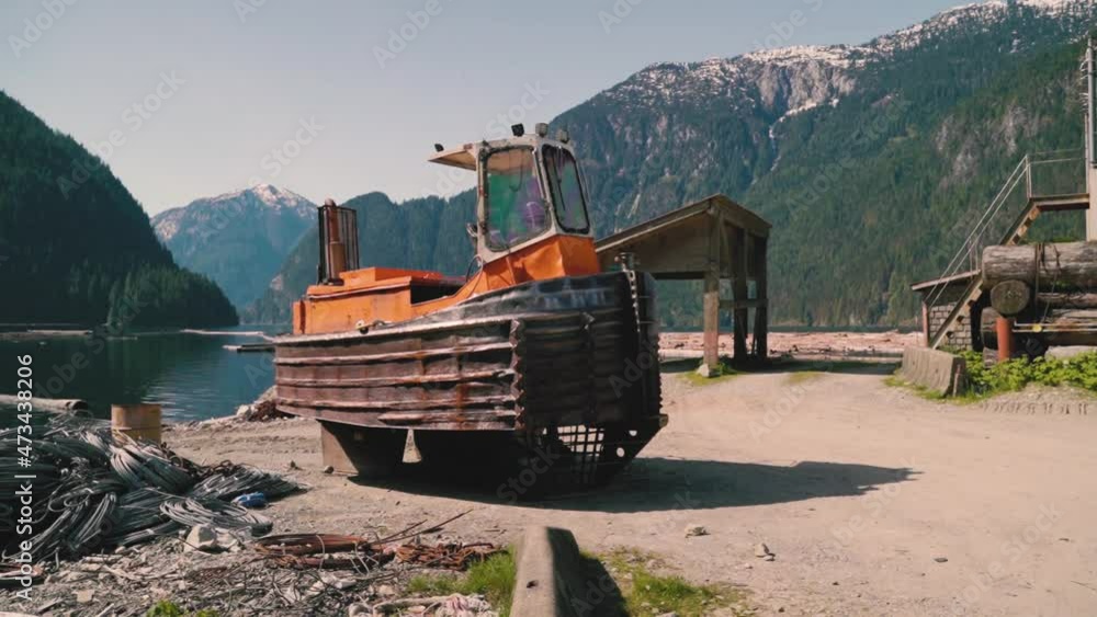 Dozer Boat for Logging Parked on Shore (Logging Boat) Dozer Boat for Logging Parked on Shore (Logging Boat)