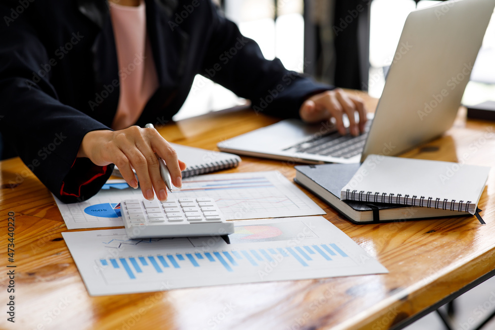 Fototapeta premium Business Woman working at office with documents on his desk, doing planning analyzing the financial report, business plan investment, finance analysis concept