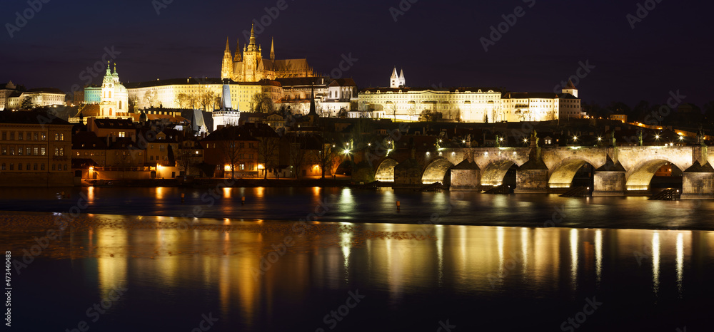 night view of prague castle and st. vitus and cathedral bridge on ece vltava at night in the center of prague
