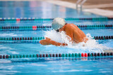 Breaststroke swimmer in a race