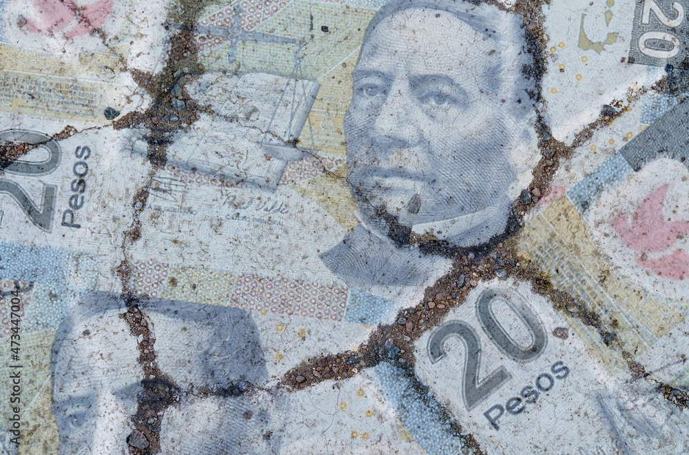 On the cracked asphalt there is a picture of the Mexican Peso. On the cracked asphalt there is a picture of the Mexican Peso.