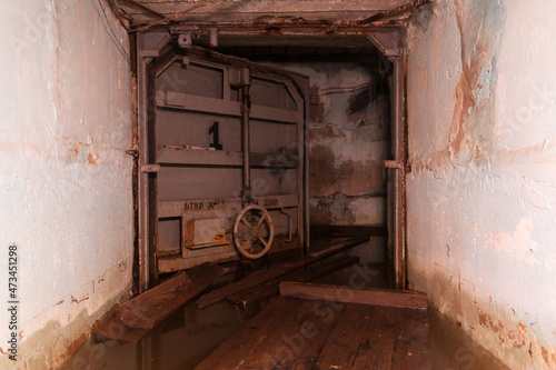 a sealed door in a flooded shelter
