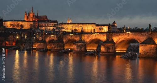 panoramic view of twilight and prague castle st. vitus cathedral and charles bridge in prague