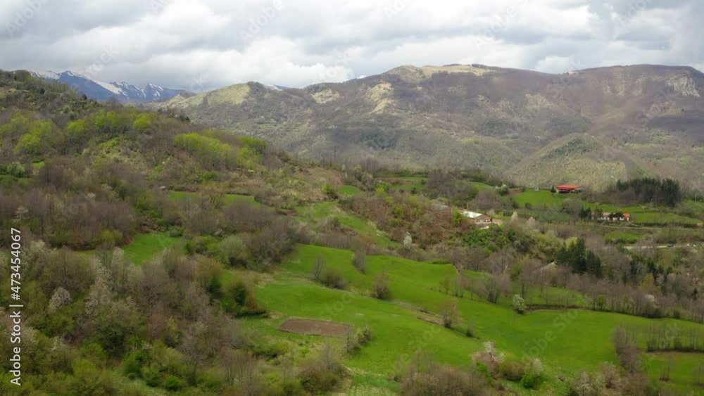 Aerial: Beautiful View Of Houses On Green Hills During Winter Season - Apennine Mountains, Italy Aerial: Beautiful View Of Houses On Green Hills During Winter Season - Apennine Mountains, Italy