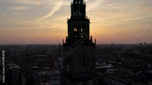 Sunset in the city center over the Martinitoren of Martinikerk in Groningen, The Netherlands.  photo