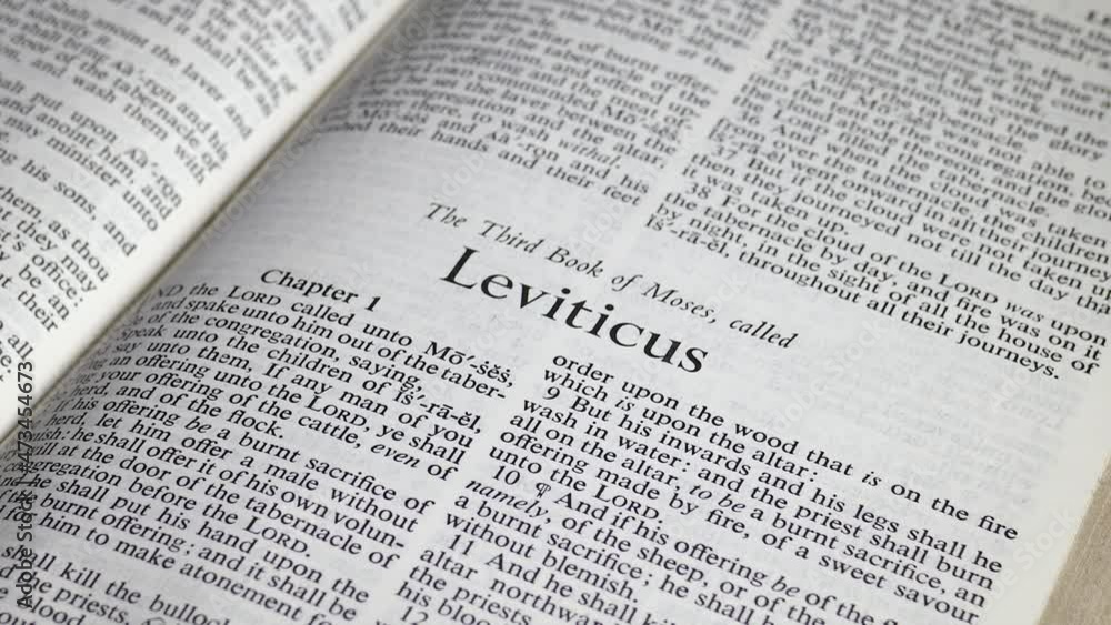 Close up shot of Bible Turning to the Book of Leviticus Close up shot of Bible Turning to the Book of Leviticus