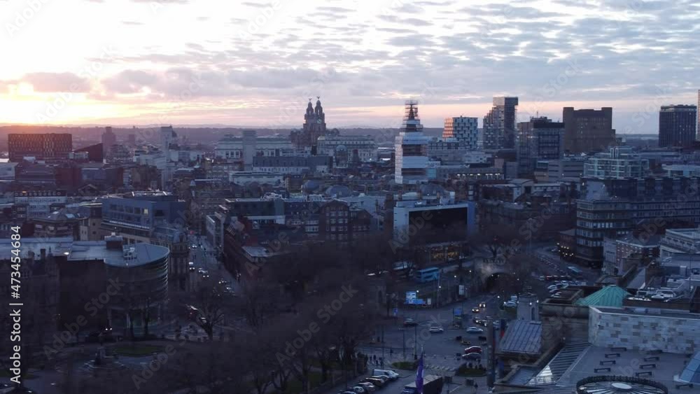 Liverpool city Christmas market sunset skyline and radio city landmark aerial view pan left