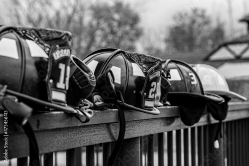 Firefighter helmets on railing