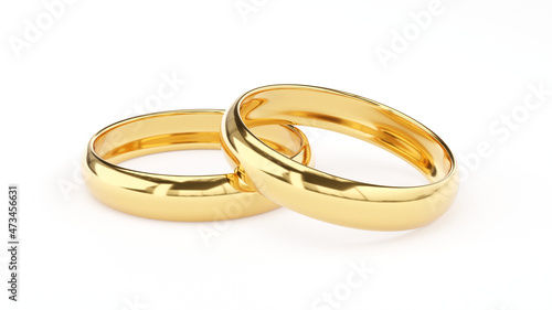 Golden wedding rings on white background