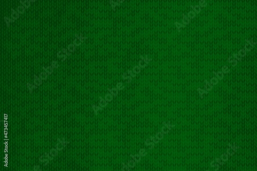 green texture of Christmas sweater  template with sweater textile with space for text  xmas minimalistic background for editing  green knitted Christmas backdrop 