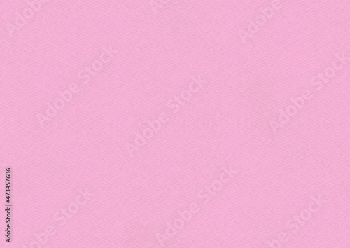 ピンク色の和柄模様（菱青海波）の和紙の質感のある背景
